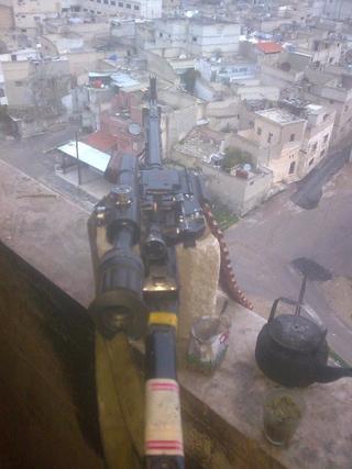 Illustration for article titled Syrian Rebel Posts Sniper's Camera Phone Photos